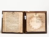 an open book with a picture of a man on it