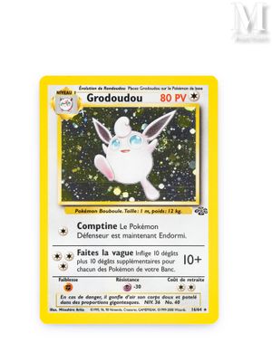 a close up of a pokemon card on a white surface