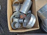 a box full of tins and other items on the ground