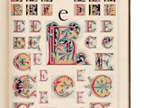 un livre ouvert sur lequel sont dessinées des lettres et des chiffres