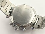 a close up of a wrist watch on a white surface