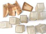 many pieces of cardboard that are sitting on a table