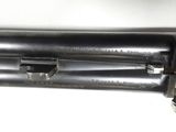 a gun that is sitting on top of a table