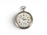 a silver pocket watch with roman numerals on it