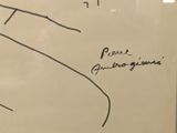 a white board with a drawing of a plane on it