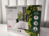a box that has a blender in it on a table