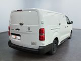 a white van that is parked in a room
