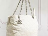 chanel white quilted tote bag with black leather trim