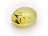 an image of a yellow quartz stone with a black line on it