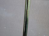 a close up of a metal pole on a tiled floor