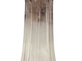 a glass vase with a bird on top of it