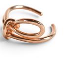 an image of a rose gold ring on a white background