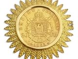 l'image d'une pièce d'or ornée d'une couronne