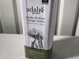 a box of olive oil sitting on a table