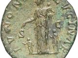 an old coin with a woman holding a child on it