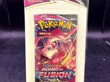 a close up of a box of pokemon trading cards on a table