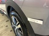 a close up of a car with a sticker on the side of it