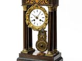 a clock that is sitting on top of a table