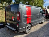 a van that is parked on the side of the road