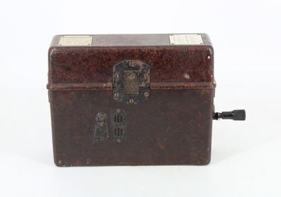 a small wooden box with a lock on it