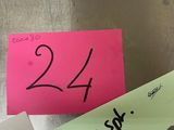 two sticky notes on a refrigerator door with the numbers 24 and 24