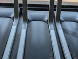 three treads are lined up in a row in front of a window
