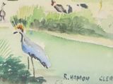 a watercolor painting of a bird standing in a pond