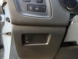 a close up of a car ' s dashboard with buttons and controls