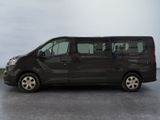 a black van that is parked in a parking lot