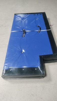 two pieces of blue plastic on the floor next to each other