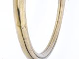 a close up of a gold ring with a diamond in the middle
