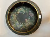 a picture of a bowl with a floral design on it