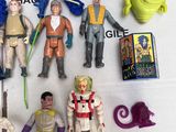 a lot of action figures that are on the table