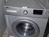 an image of a washer and dryer in a bathroom