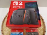 two nintendo wii controllers in the box on the table