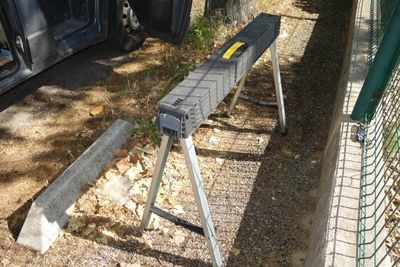 a bench that is sitting on the side of the road