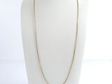 a gold chain necklace on a mannequin mannequin mannequin mannequin mannequin mannequin mannequin mannequin manne
