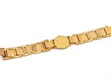 an image of a gold watch bracelet on a white surface