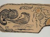 a drawing of a woman with long hair on a piece of paper