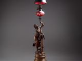 an image of a lamp that is on a table with a lamp shade on top of it