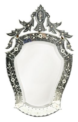 silver plated mirror with ornate design on a white background
