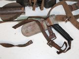 many different types of weapons on the table