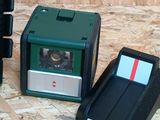 two cameras sitting on a table next to each other
