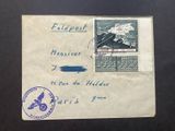 an old envelope with a stamp on it with a picture of a plane