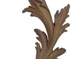 carved wood corble with a leaf design on a white background