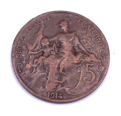 an old coin with a picture of a man riding a horse on it