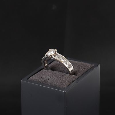 an image of a diamond ring in a black box