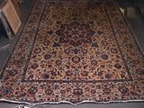a large oriental rug on the floor in a room