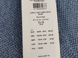 a close up of a tag on a blue sweater