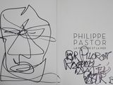 a book with a drawing of a man ' s face on it